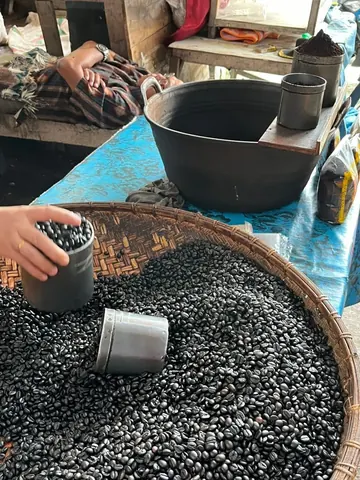 Roasted Robusta coffee at Makale market, Tana Toraja