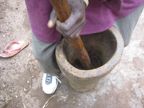 Grinding Kilimanjaro coffee in Marangu